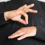 Hand Signals & Silent Communication Every Tactical Team Should Know close-up-interpreter-teaching-sign-language_23-2148590277
