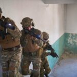 Room Entry Tactics: Clearing Spaces Safely & Effectively (Civilian & Safety Focused) modern-warfare-soldiers-ascent-stairs-combat_530697-92731